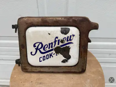 “Cast Iron / Enamel, Renfrew Cook Stove Door” Located near Berwick, NS. Approximately 9” wide, 7” ta...