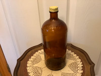 Vintage Amber Javex Bottle with a Yellow Screw Top