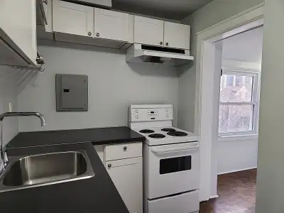 Spacious 1-Bed + Den Apartment with Balcony & Parking!