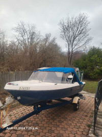 Boat, trailer and motor 