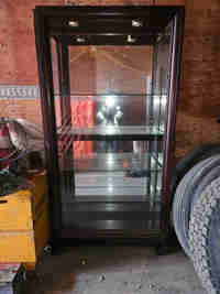 China cabinet with sliding door and lights