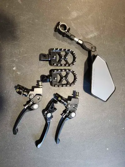 All in pic for .............$69 Foot pegs Mirror Brake levers Brake caliper