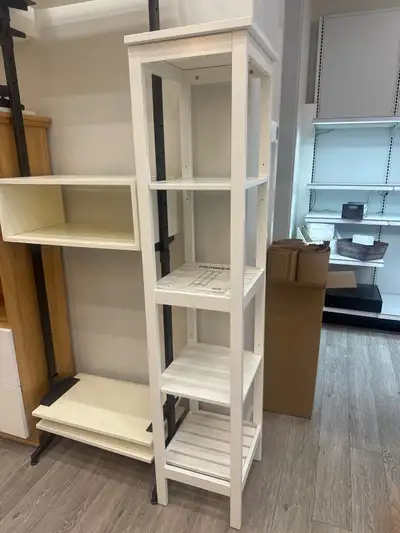 This is a used IKEA Hemnes shelf, perfect for adding storage to any room. It features a classic desi...