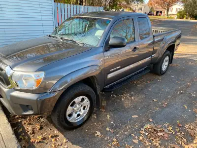2014 Toyota Tacoma: 4 cylinder, 4X4. Brand new tires a year ago. 300K. Good shape and runs well. Ac,...