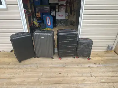 2 hard shell Suitcases, View more