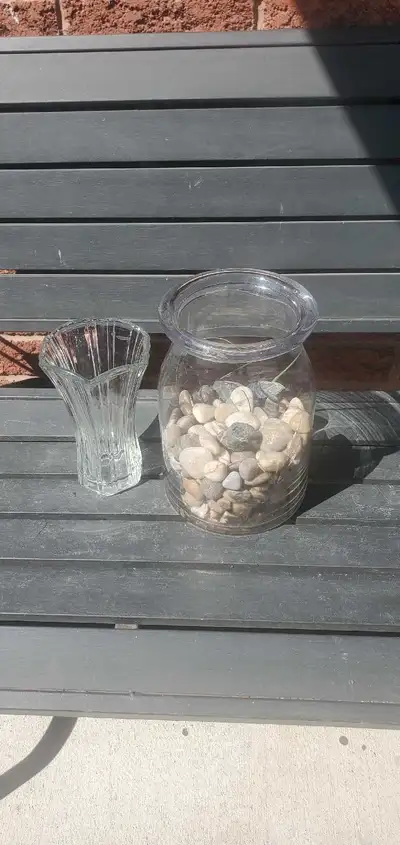 Designer Vases includes stones. Excellent condition. Dimensions, large vase, height 11 in, diameter...