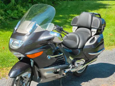 Powerful, Comfortable touring bike. Lots of luggage storage. Cruise control.
