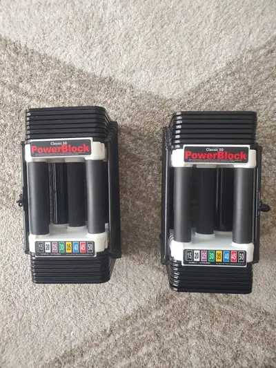 Like new Powerblock 50 pound adjustable dumbbell set, View more