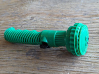 8 inch green hose nozzle with a 2.5 inch head