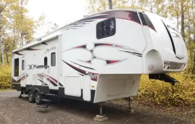Toy hauler RV 2011. Sleeps 8 comfortably. Main bdrm, queen bed w/sliding door for privacy and a buil...