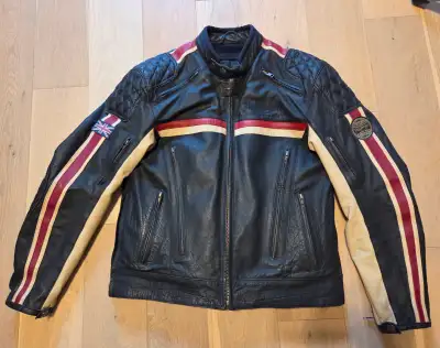 Selling a genuine Triumph leather motorcycle jacket in excellent condition. This is a high-quality,...