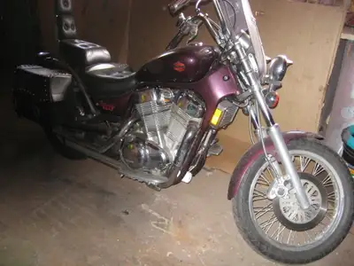garage stored. has windshield, foot boards, highway pegs, new rear tire, new brakes, saddle bags, ai...