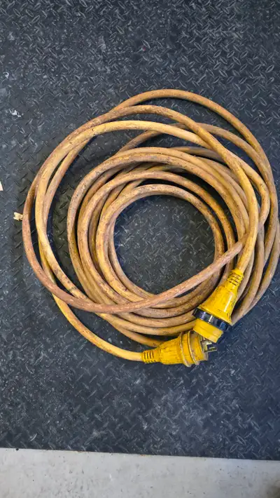 50 foot 30 amp electrical cord. A little dirty but works perfect, no issues. $50