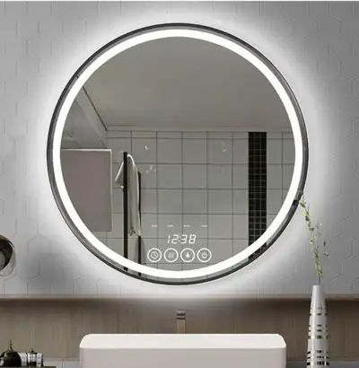 22” Round LED wall mirror with clock and anti-fog features.