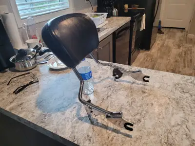 Harley not Chinese. Passenger back rest fits 2009 and up touring models. Excellent condition $175