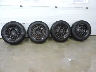 Set of 4 F-150 6-bolt steel rims. Rear tires are Cooper Discoverer M+S in P255/70R18 with 13/32 trea...