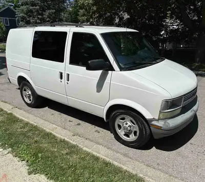 Well-maintained 2004 Chevy Astro Cargo Van - rear-wheel drive, only 124,842 km! Reliable and versati...