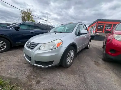 Suzuki SX4 2013 Manuelle , Très Propre, Mécanique A1, AWD, Seulement 78 500 km. Bien équipée. $3995....