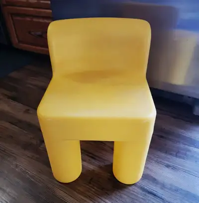 Vibrant yellow child’s chair. Solid and sturdy. Great for playroom. Suitable for toddlers to prescho...