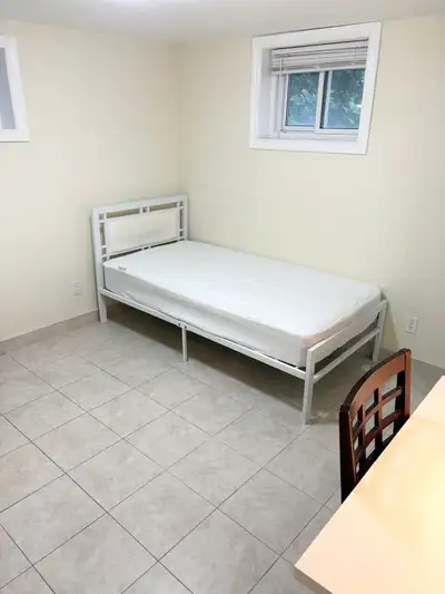 Private, spacious, fully furnished room with private bathroom and fridge in basement of house in Nor...