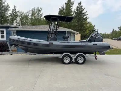The Pro 7 is a specialized rigid inflatable boat, typically used by police, fire rescue, whale watch...