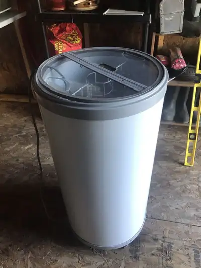Tall round electric upright cooler.measurements are 36” high,18” diameter,20” deep for cooler area.e...