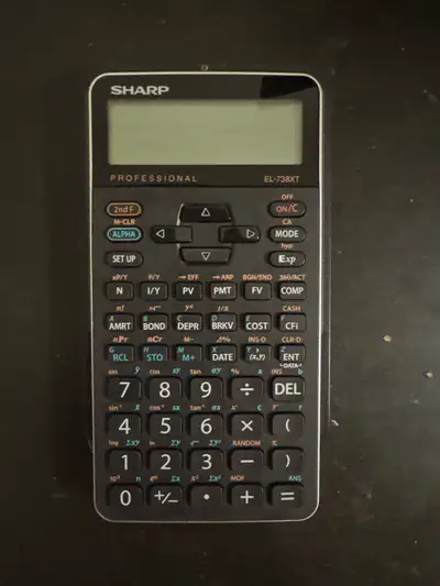 This is a used Sharp EL-738XT financial calculator, perfect for accounting, finance, and business ca...