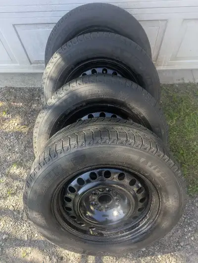 Set of 4 Michelin X-Ice 235 65 17 snow tires on rims. The tread is very good on them at 7/32nds of a...