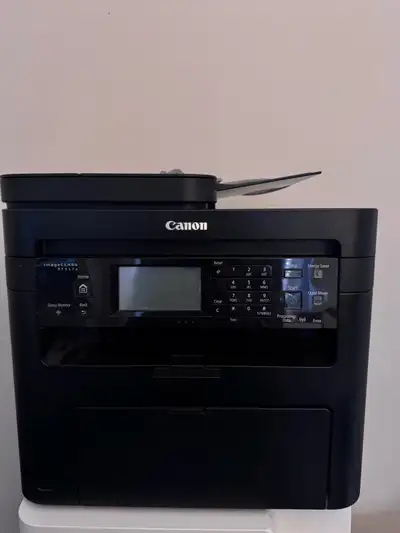 Canon ImageCLASS MF217w and 3 toner cartridges, View more