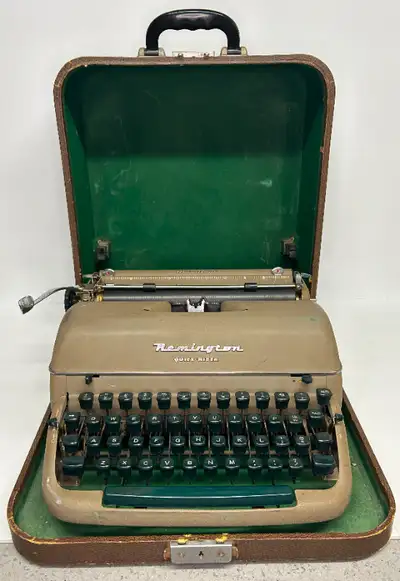 Very Cool Piece of History! This 1950's Remington Rand Quiet-Riter Typewriter with Case would make a...