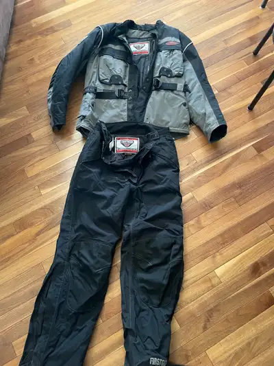 This is a used FirstGear cold weather riding suit, including both the jacket (size L) and pants (siz...