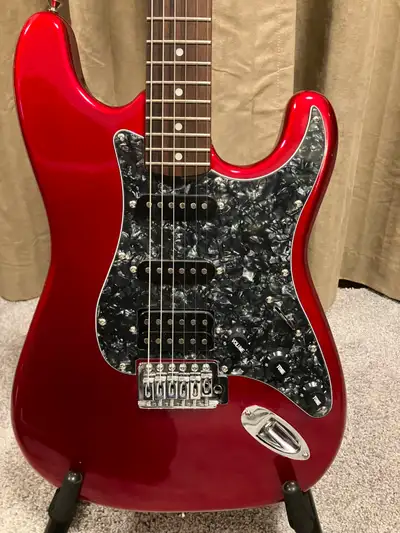 Nice Candy Apple Red. Refinished Body. New upgraded electronics. Alnico V Pick-ups. Black Pearl Pick...