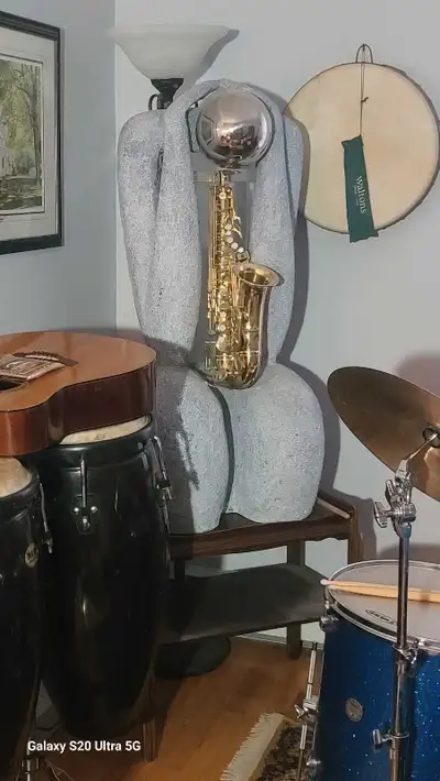 The Sax Lady Playable saxophone if taken apart Cascading water fountain LED lighting Only 30 lbs