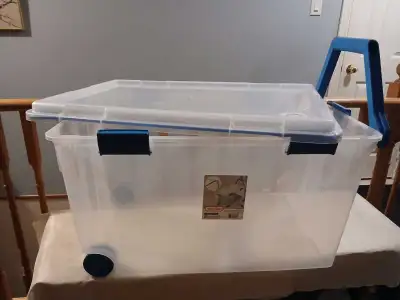 Clear wheeld latch box, new, View more