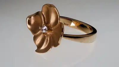14k yellow gold flower ring with diamond (7.5 size), View more