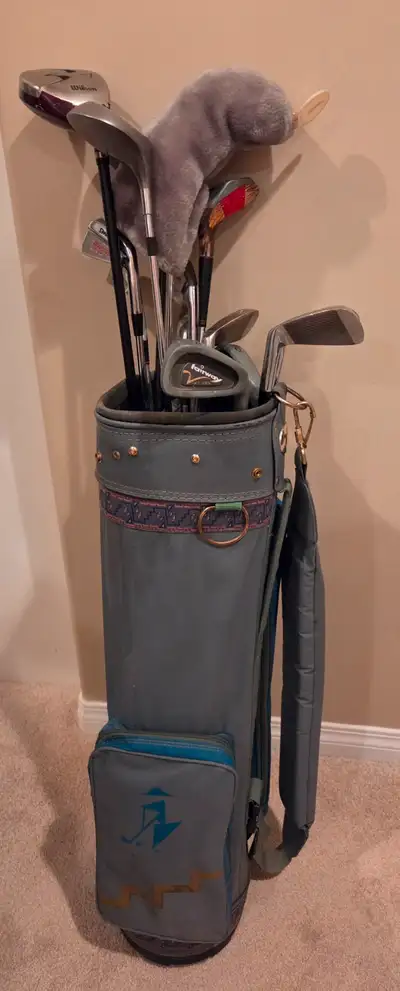 Mix of right handed golf clubs with a golf bag, View more