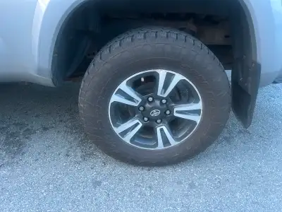 Selling a used Toyota Tacoma OEM wheel and tire, Both in excellent condition. Here are some specific...
