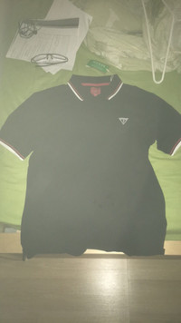 Guess Polo black brand new for 50$