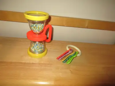 an hour glass and keys, View more