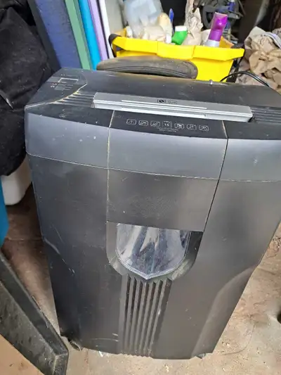 The Staples SPL-1506X is a commercial-grade paper shredder designed to shred paper, credit cards, an...