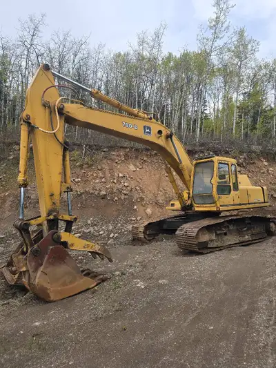 John deere 790 d excavator has hydraulic thumb was told engine was rebuild few years ago. Runs and f...