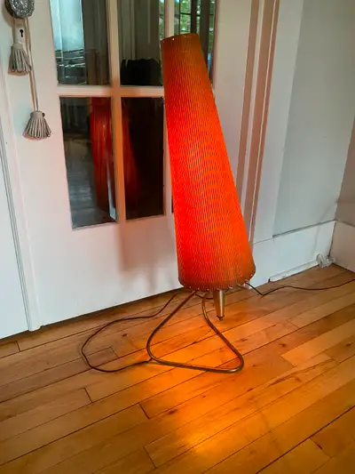 Very interesting and cool Atomic era lamp. Looks like a rocket! Very funky for your mid century deco...