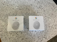 Two Google Nest Thermostats