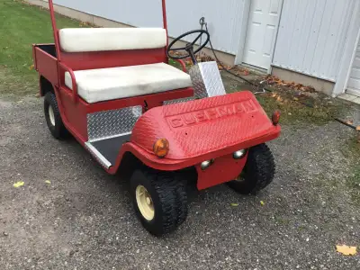 Side by side Cushman 14 HP runs well Briggs and Stratton motor with utility box $2900 phone 519-484-...