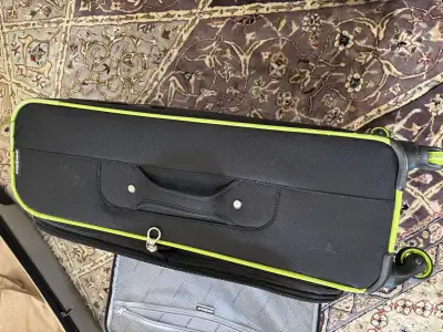 mid size luggage $30 check in., View more