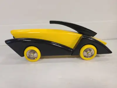 Beautiful vintage minimalistic toy car, wooden with metal hubs. Measurements: 12" long, 5" tall, 4"...