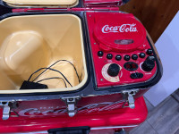 Coca Cola cd player and cooler and another single cooler 