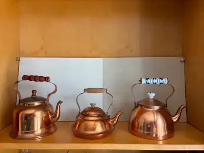 Selling my collection of vintage copper kettles. Five in total . Photos shows both sides of the kett...