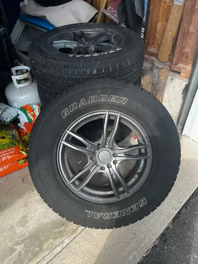 These General Grabber tires, sized at 225/75R16, come mounted on stylish rims and are in excellent c...