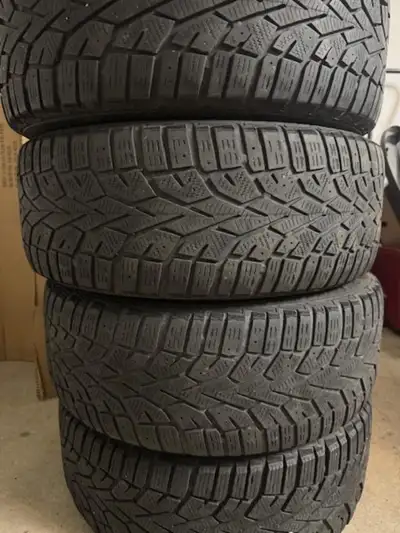 Set of 4 205/55 R16 winter tires and rims Was used on a Toyota matrix 2010 Rim size 5x100 The center...